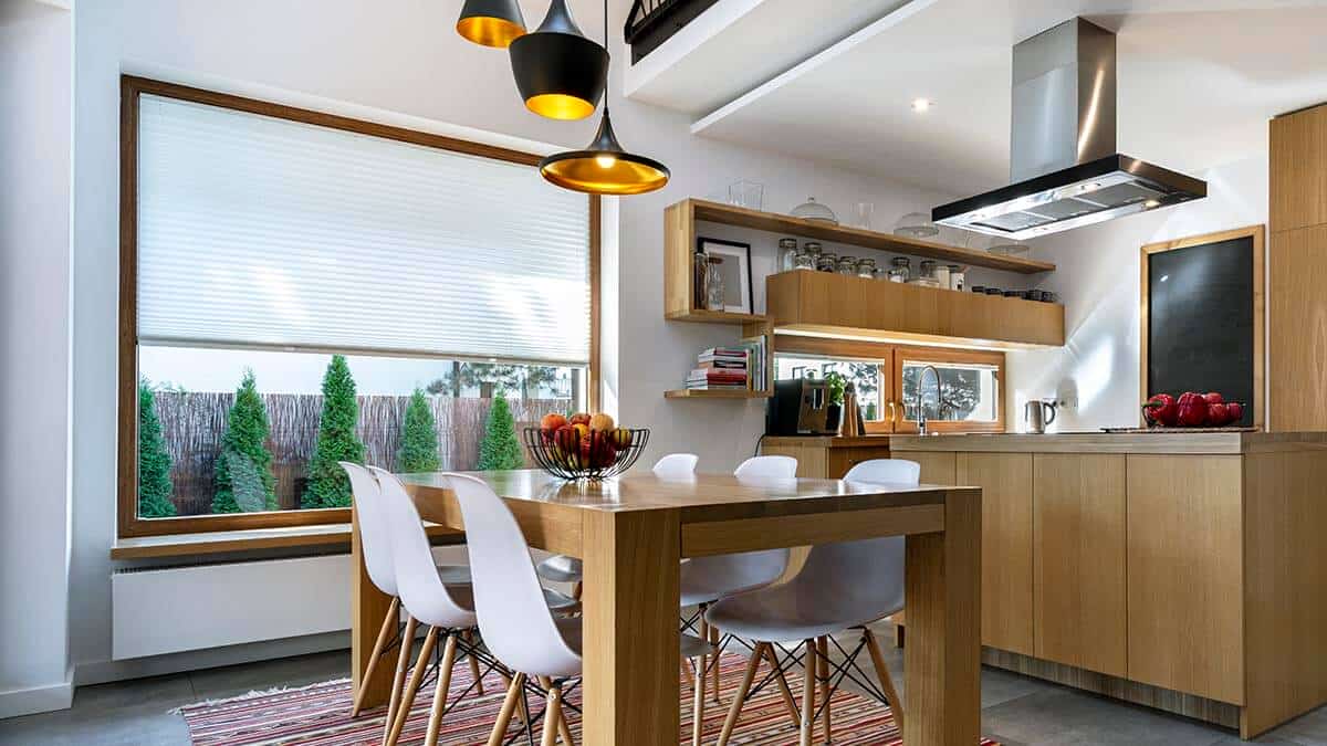 Modern interior design - open space kitchen in wooden finishing